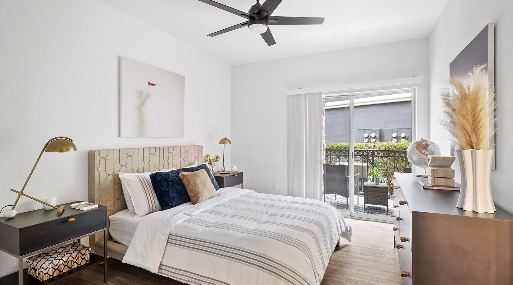 bedroom with bed and large window