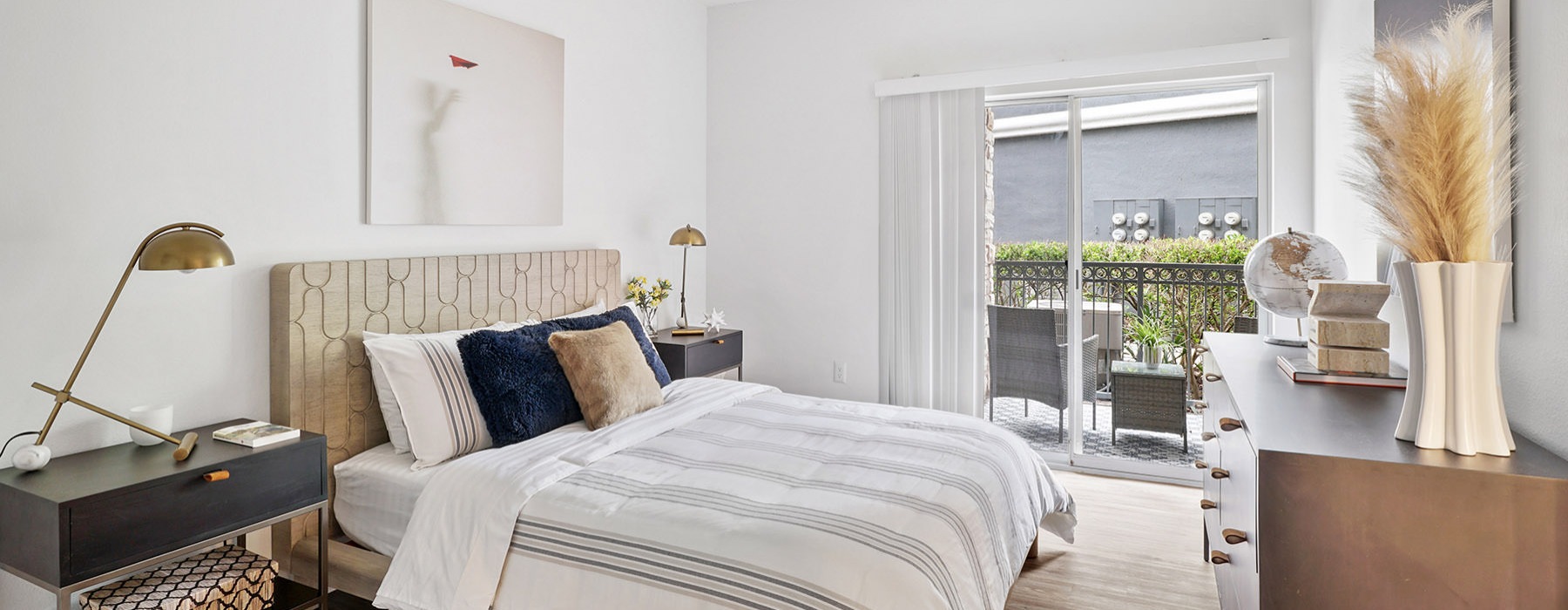 bedroom with bed and large window