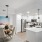 a kitchen with a dining table and chairs
