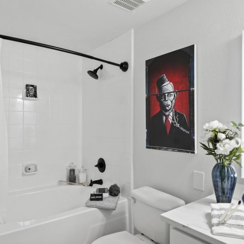 Spacious bathrooms with everything you need a bathroom with a shower toilet sink and mirror