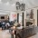 a lobby with a fireplace and couches